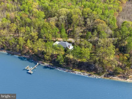 a house with trees in the background