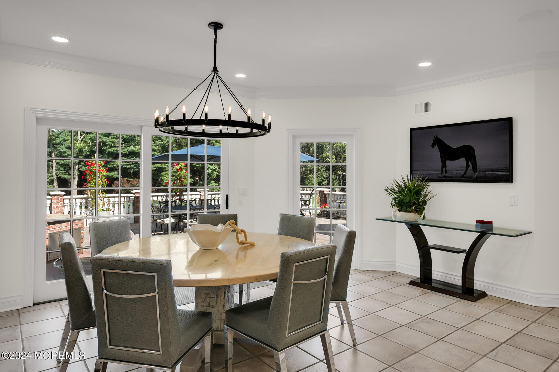 147 Heulitt Road Colts Neck, NJ 07722 - Photo 19 of 49 a dining room with furniture a chandelier and window