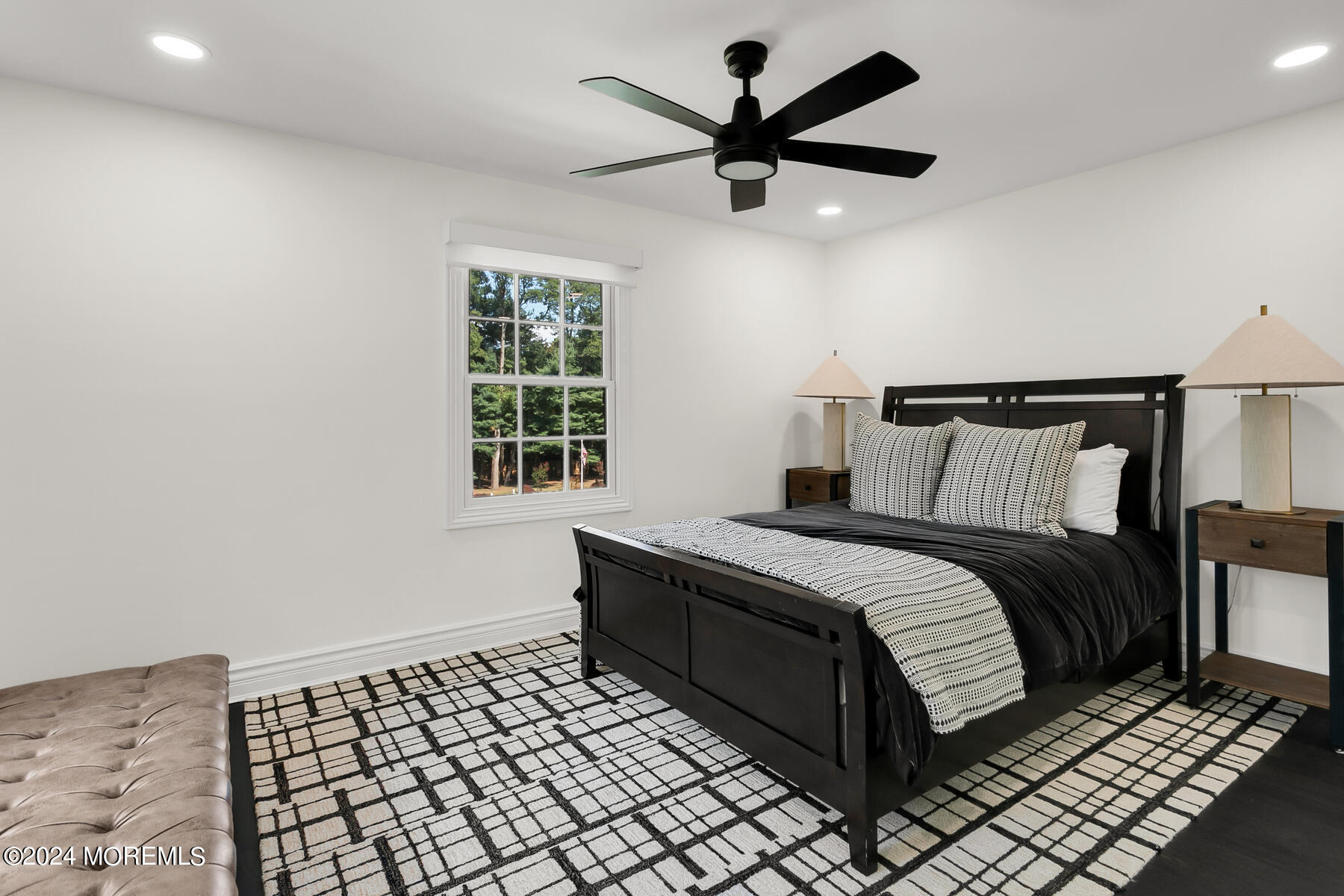147 Heulitt Road Colts Neck, NJ 07722 - Photo 22 of 49 a bedroom with a bed and window