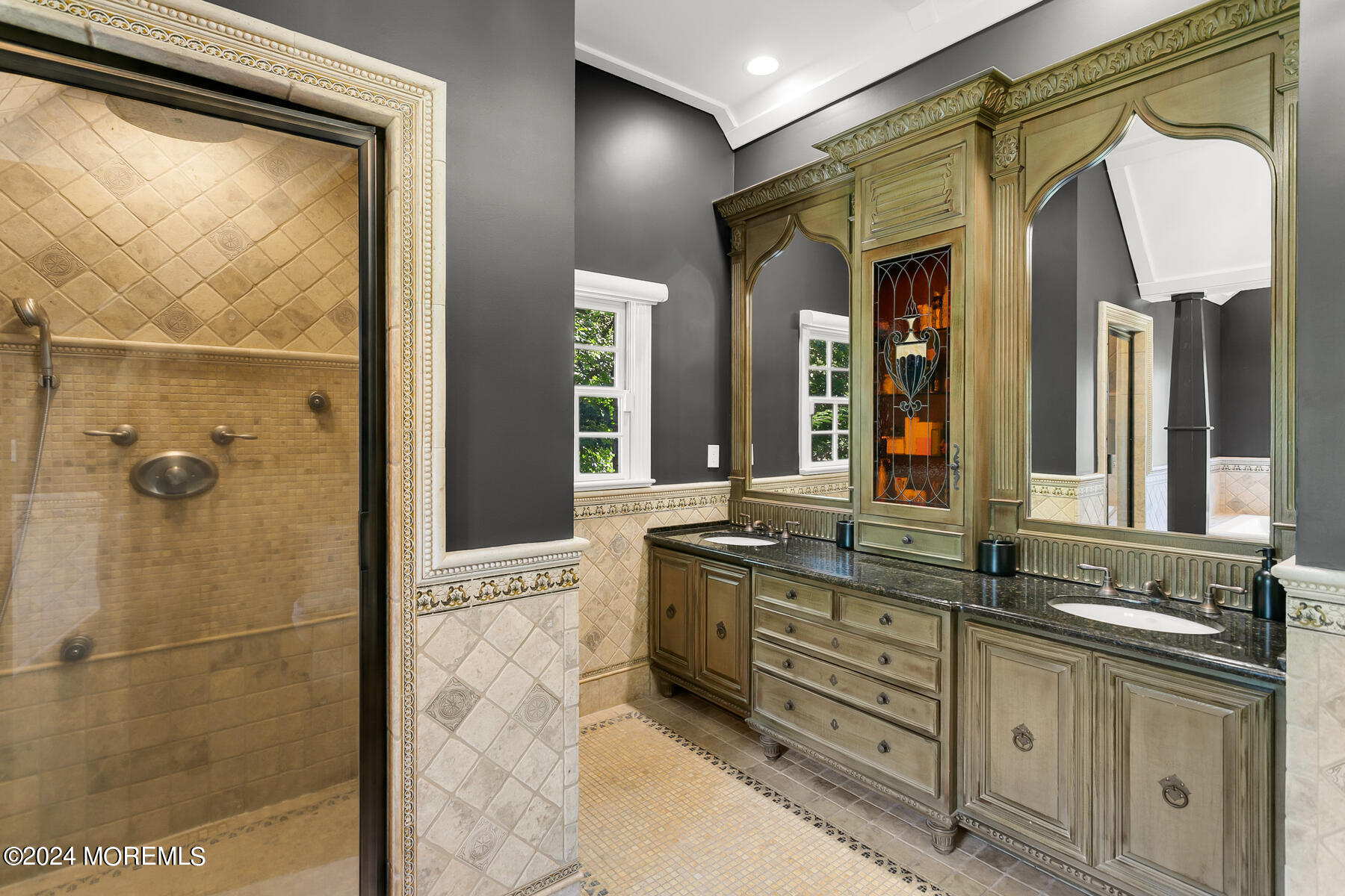 147 Heulitt Road Colts Neck, NJ 07722 - Photo 30 of 49 a bathroom with a granite countertop sink mirror and a shower