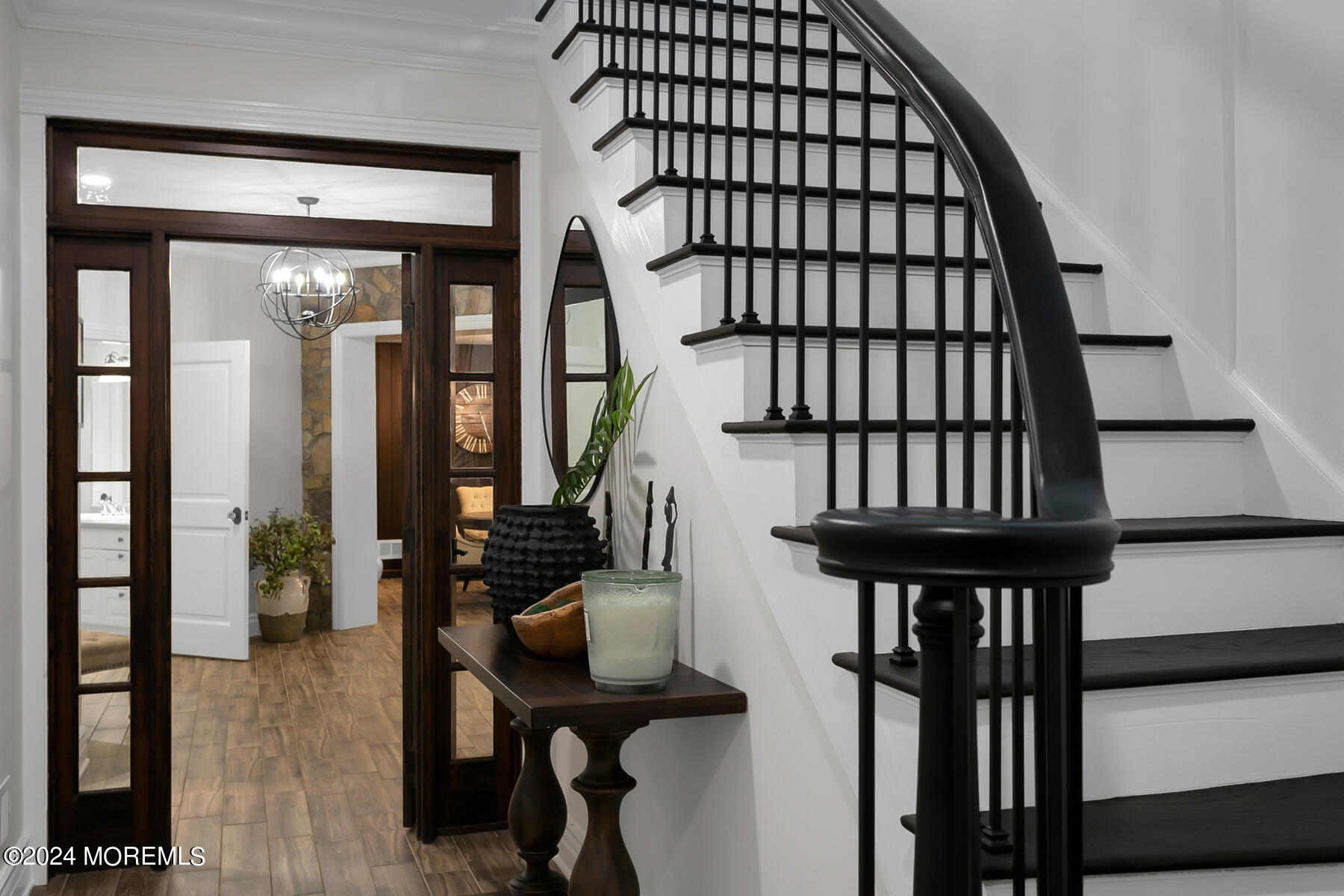 147 Heulitt Road Colts Neck, NJ 07722 - Photo 32 of 49 a view of staircase with wooden floor and furniture