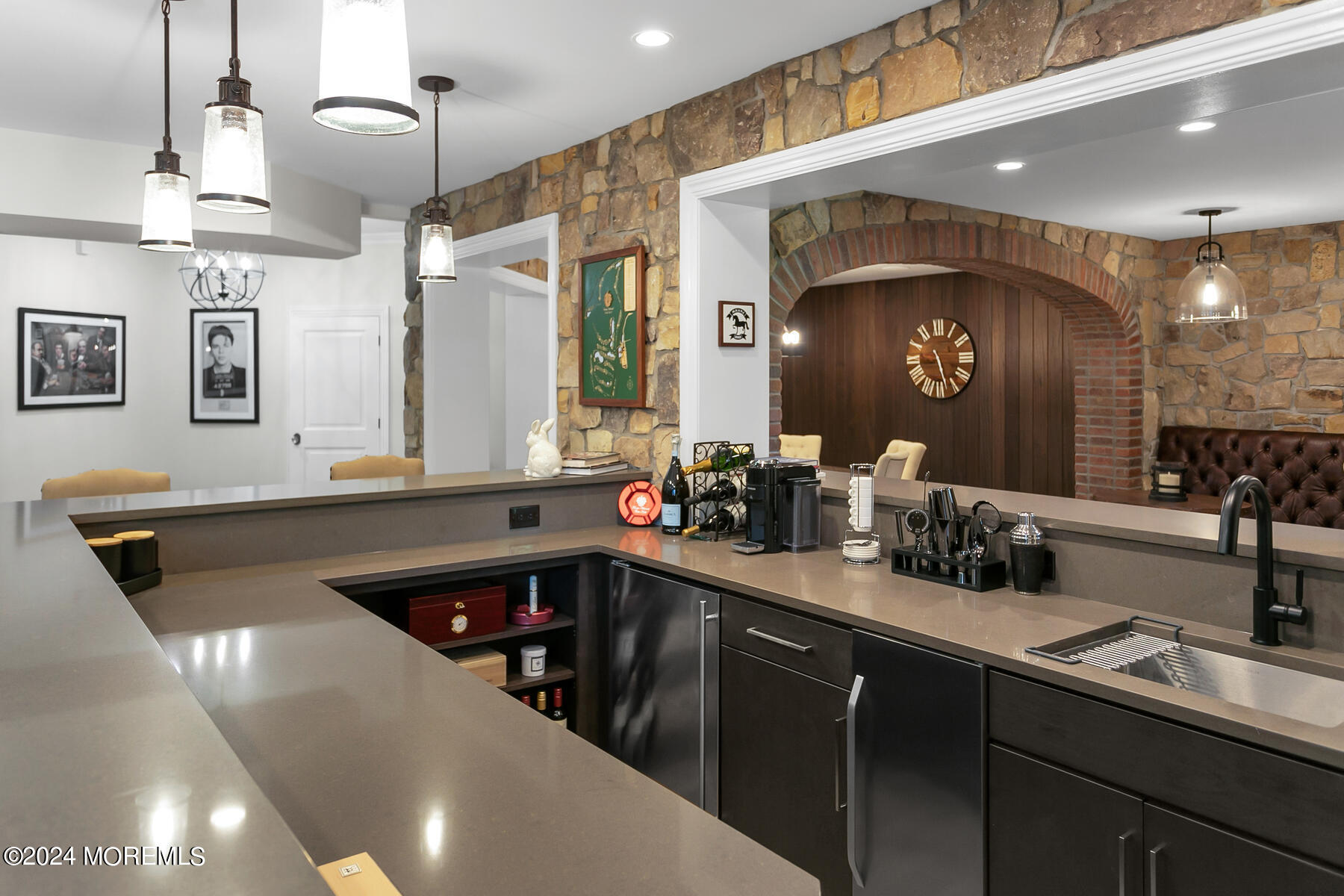 147 Heulitt Road Colts Neck, NJ 07722 - Photo 39 of 49 a kitchen with a sink and a refrigerator