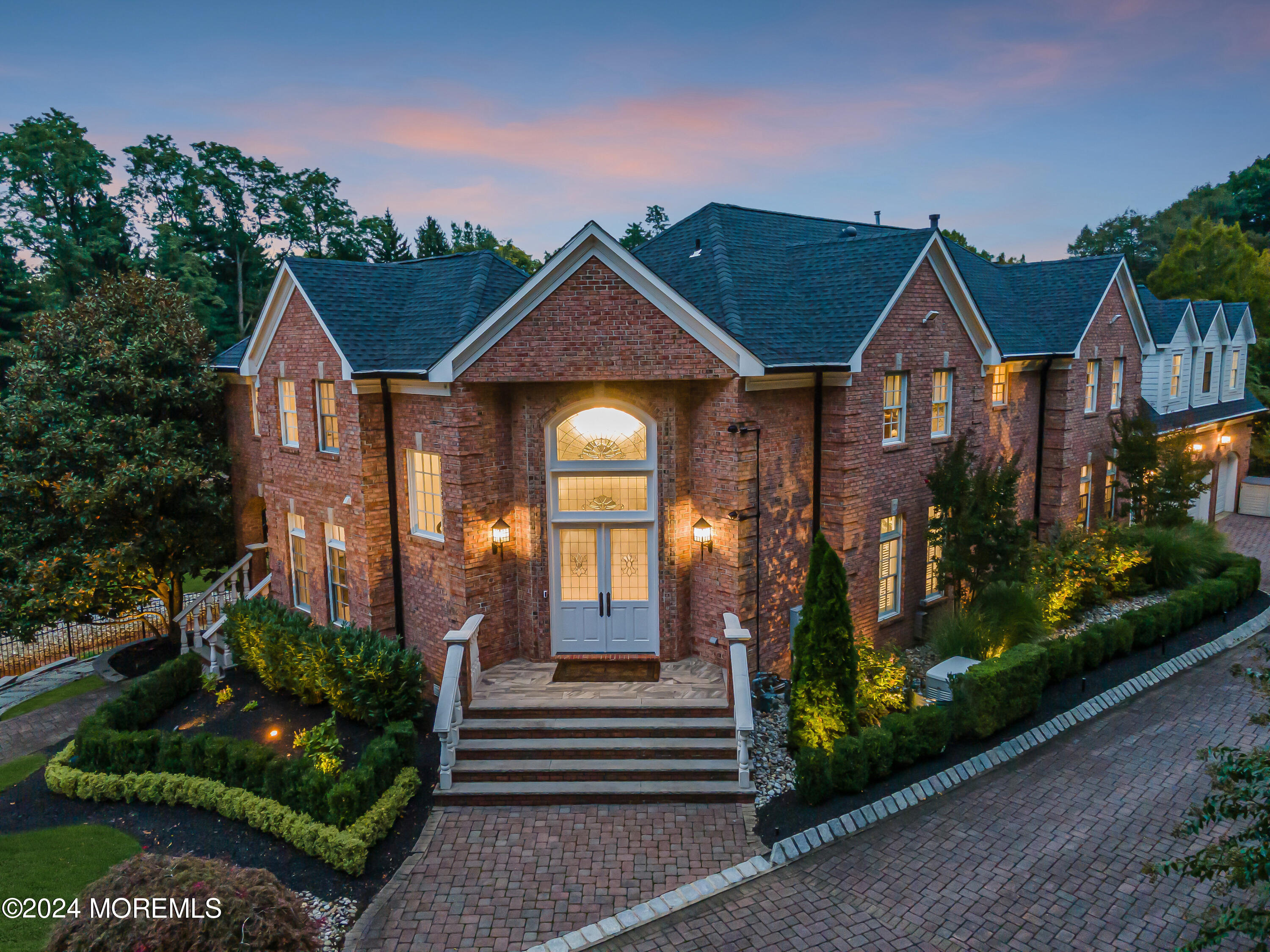 147 Heulitt Road Colts Neck, NJ 07722 - Photo 4 of 49 a front view of a house with a yard