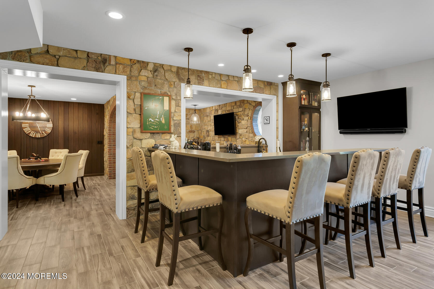 147 Heulitt Road Colts Neck, NJ 07722 - Photo 42 of 49 a dining room with furniture and wooden floor