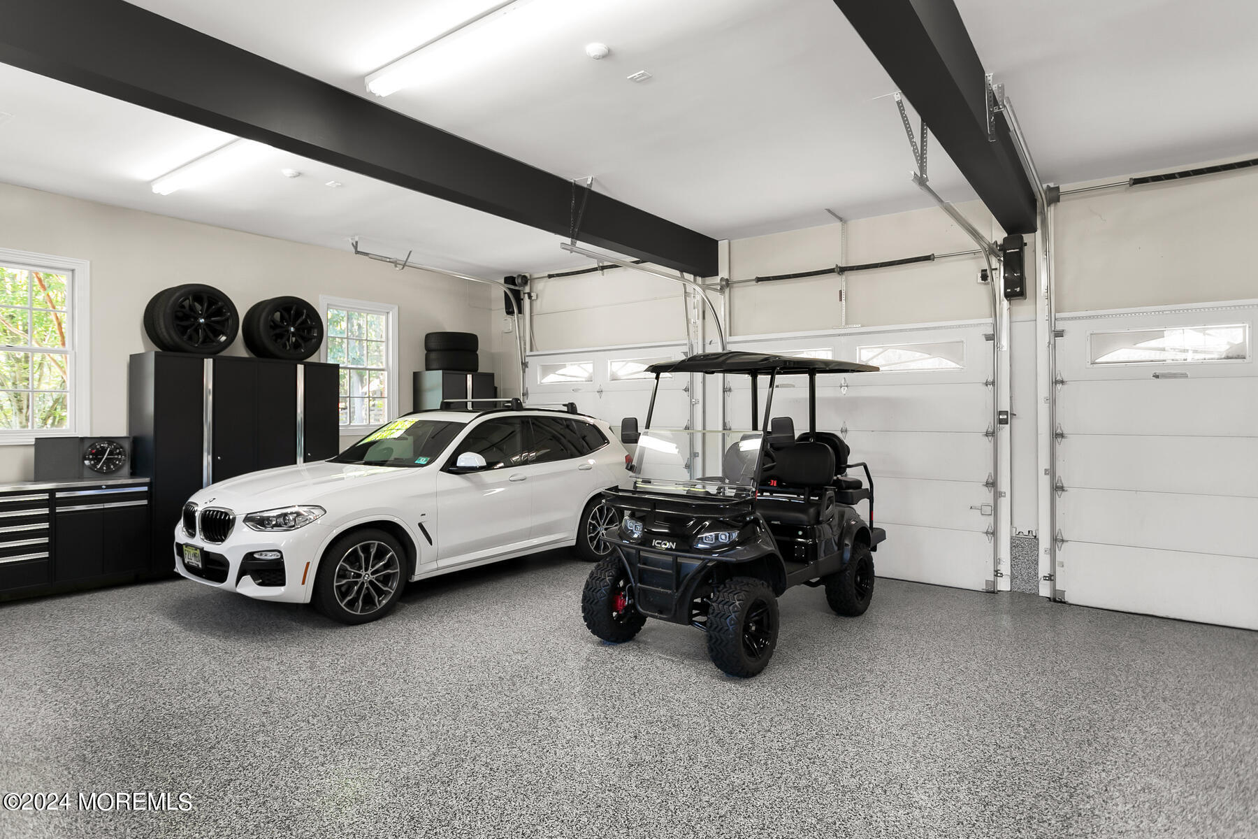 147 Heulitt Road Colts Neck, NJ 07722 - Photo 44 of 49 a car parked in a garage