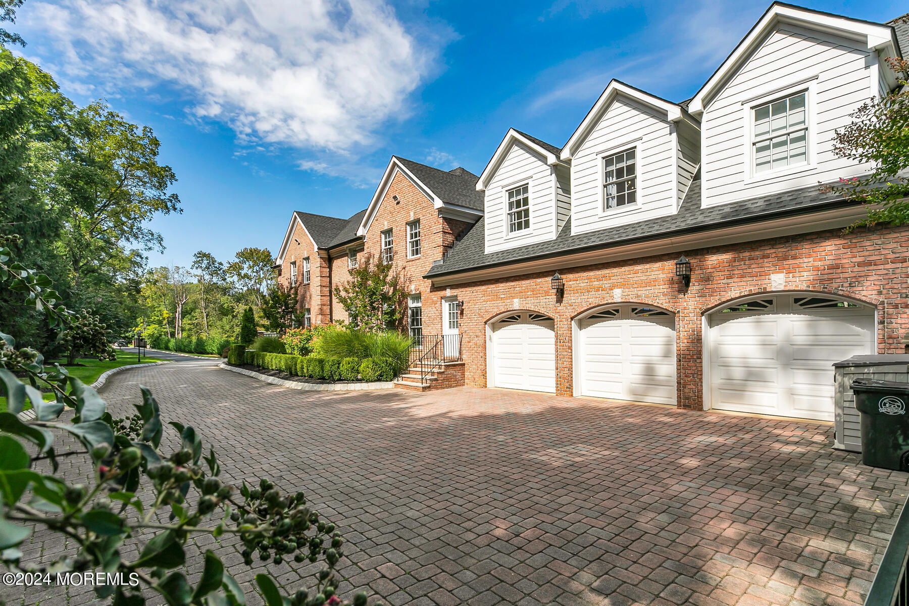 147 Heulitt Road Colts Neck, NJ 07722 - Photo 7 of 49 a front view of a house with a garden