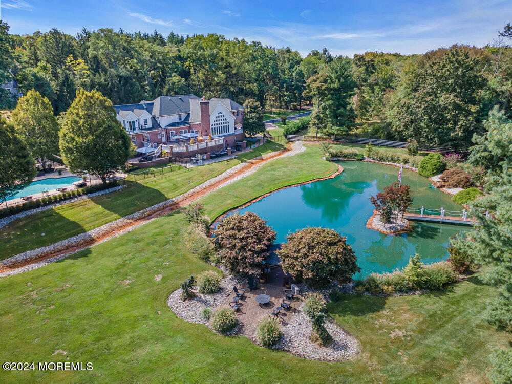 147 Heulitt Road Colts Neck, NJ 07722 - Photo 10 of 49 a view of a house with a big yard