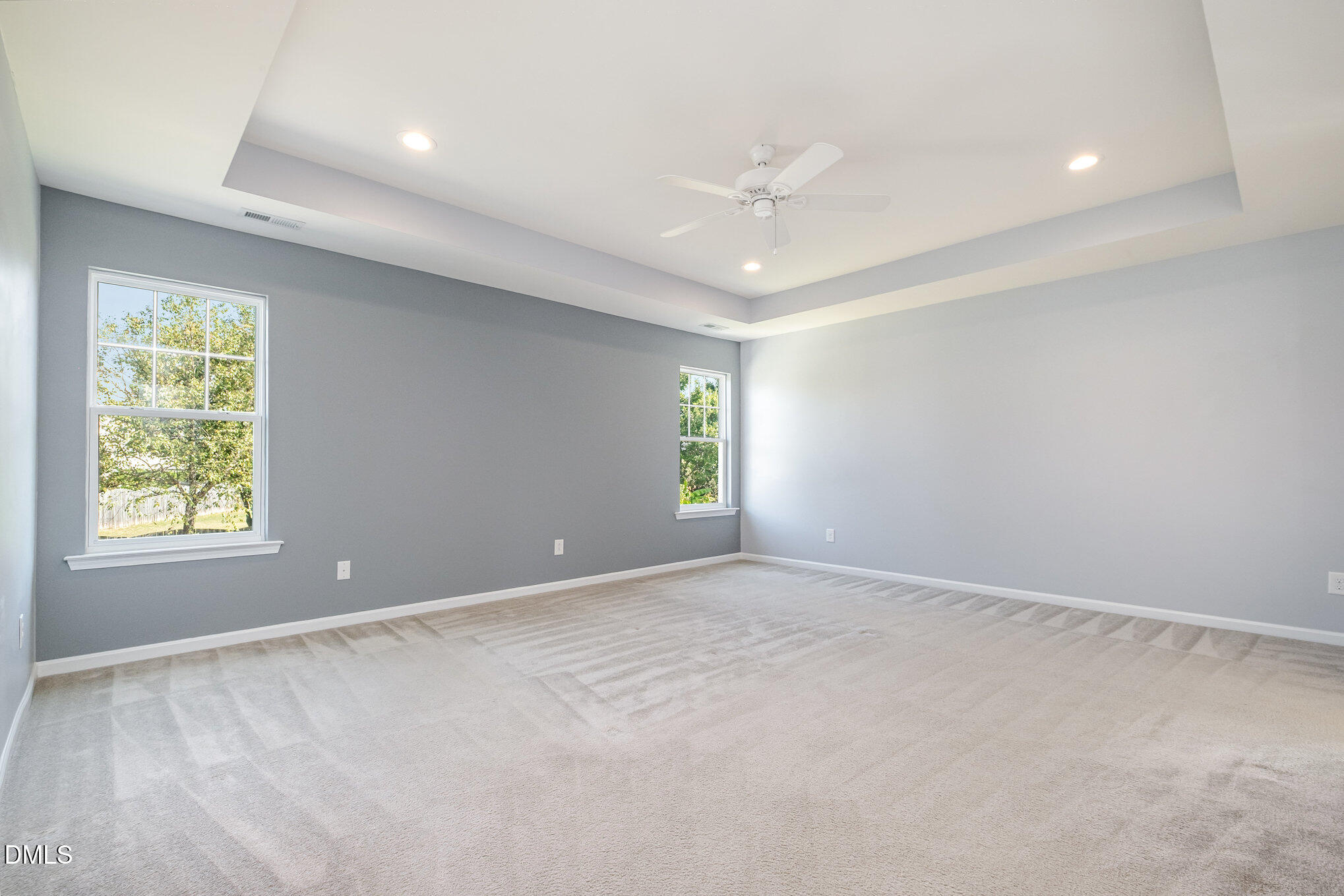 2032 Kirkhaven Road Morrisville, NC 27560 - Photo 14 of 32 an empty room with windows and closet
