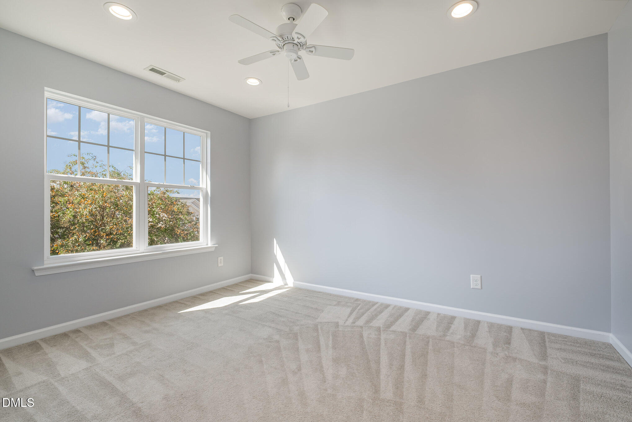 2032 Kirkhaven Road Morrisville, NC 27560 - Photo 19 of 32 a view of an empty room with a window
