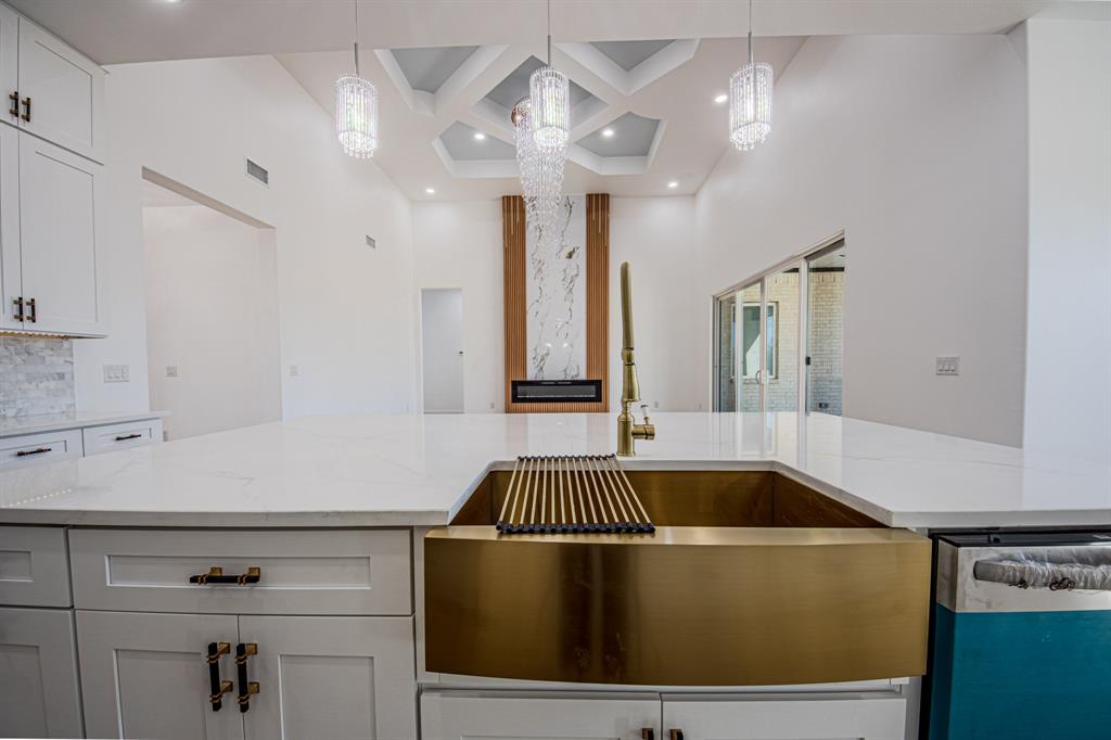 1001 Henry Way Springtown, TX 76082 - Photo 18 of 36 View of Living Area from Island. Look at the Living Room Ceiling and Lighting