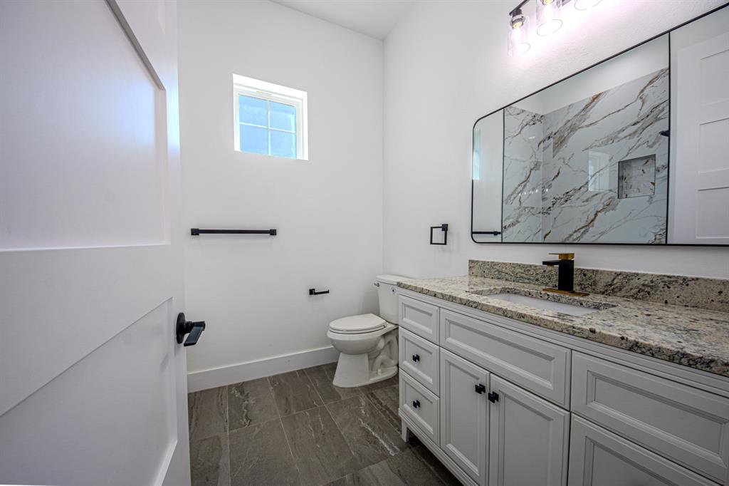 1001 Henry Way Springtown, TX 76082 - Photo 23 of 36 Third Bathroom with Tub next to 4th Bedoom
