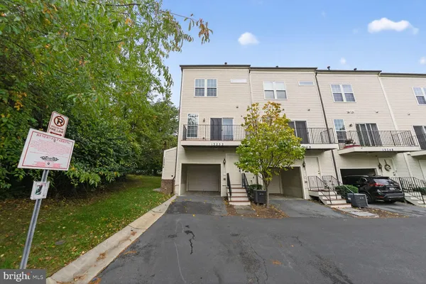 a view of car parked in front of house