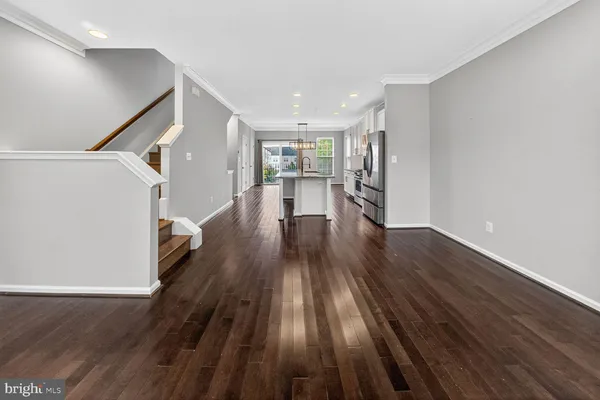 a view of entryway with wooden floor