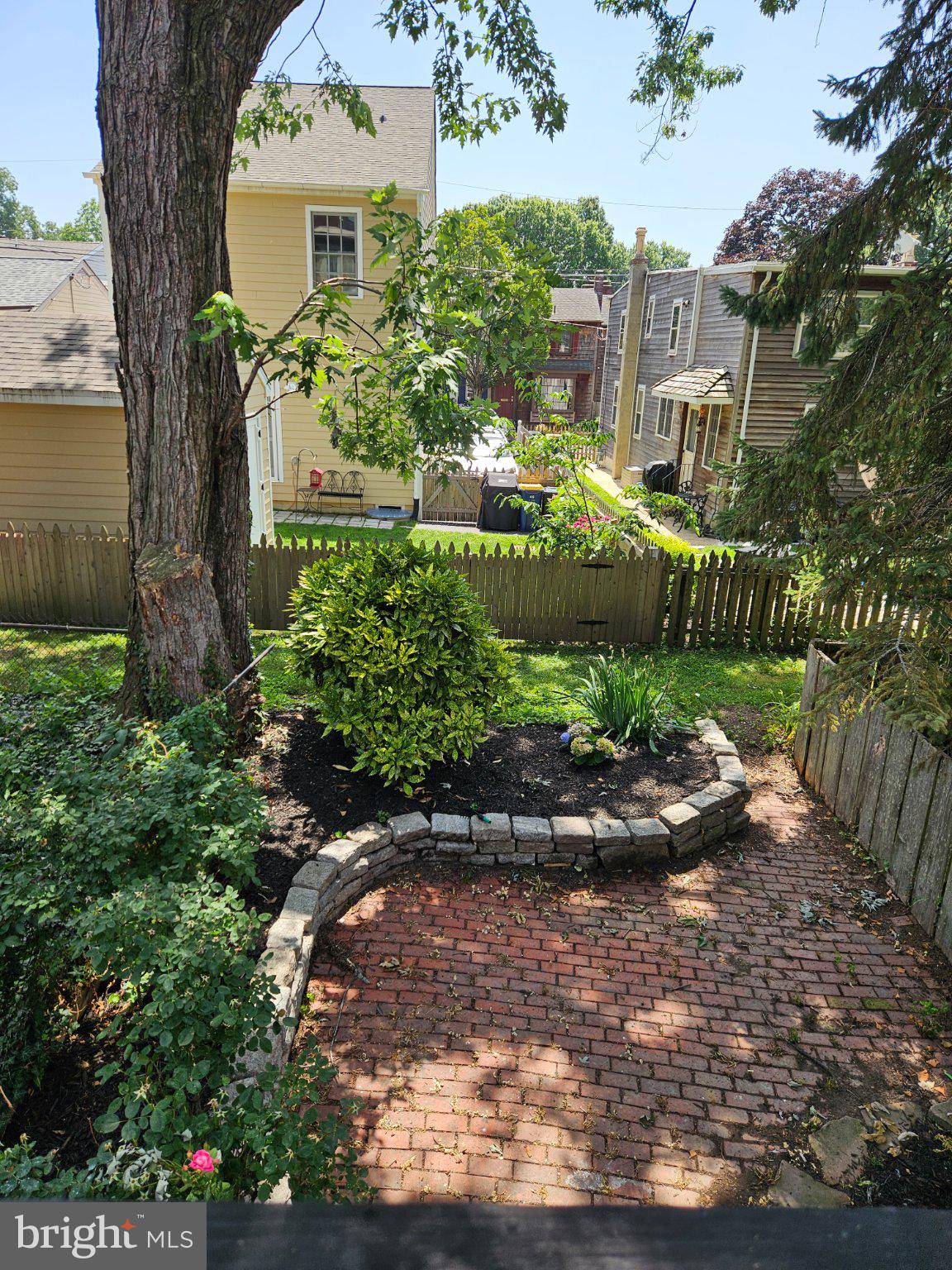 53 West 4th Street New Castle, DE 19720 - Photo 21 of 21 Charming garden retreat with brick path.