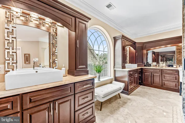 a living room with furniture fireplace and a table
