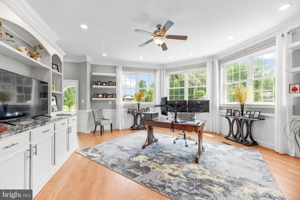 a large bathroom with a glass door shower and sink