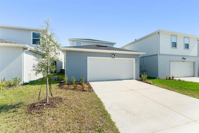 a house view with a backyard space