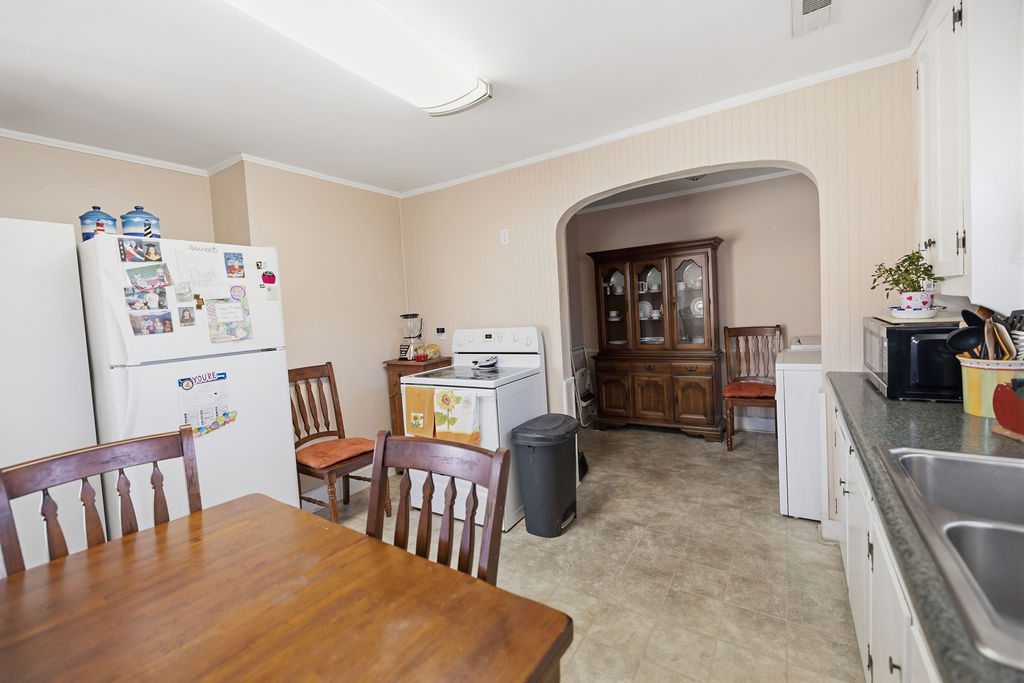 3212 Dixon Road Anderson, SC 29625 - Photo 19 of 23 This kitchen offers practical amenities, with ample counter space and appliances, perfect for daily living.