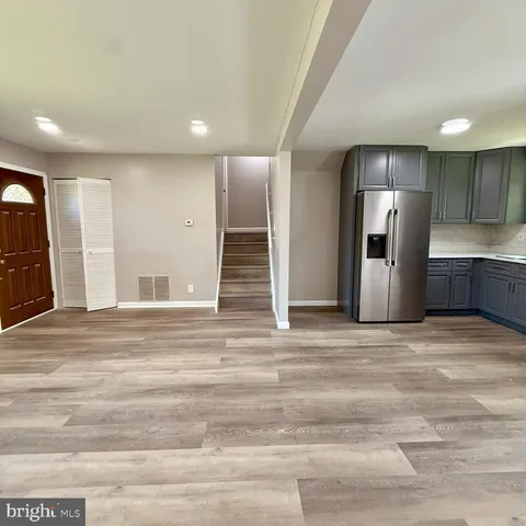 a view of a kitchen with a sink