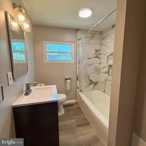 a bathroom with a sink and a bathtub