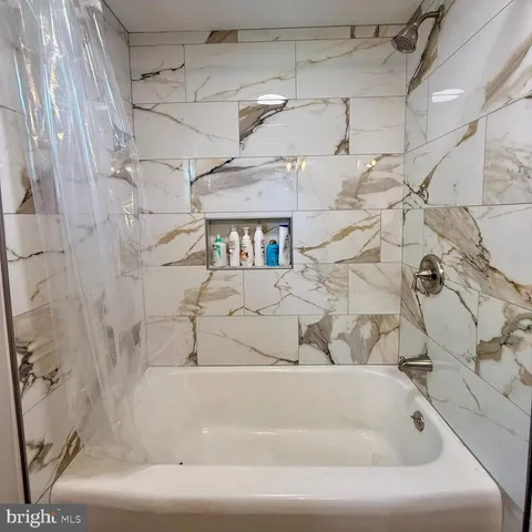a bathroom with a bathtub