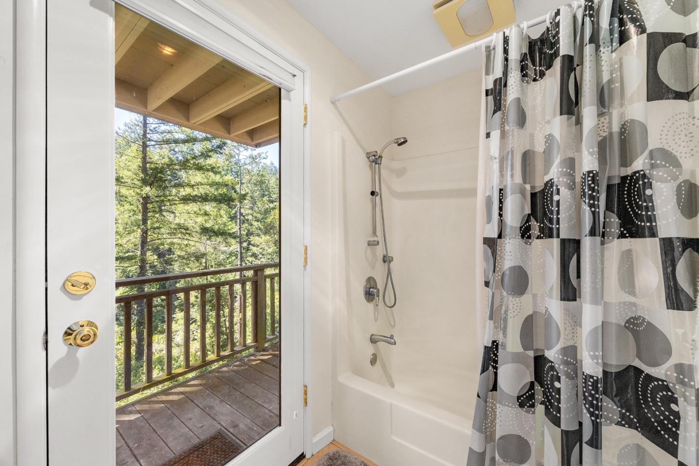 2000 Glen Canyon Road Santa Cruz, CA 95060 - Photo 32 of 41 a bathroom with a bathtub and shower