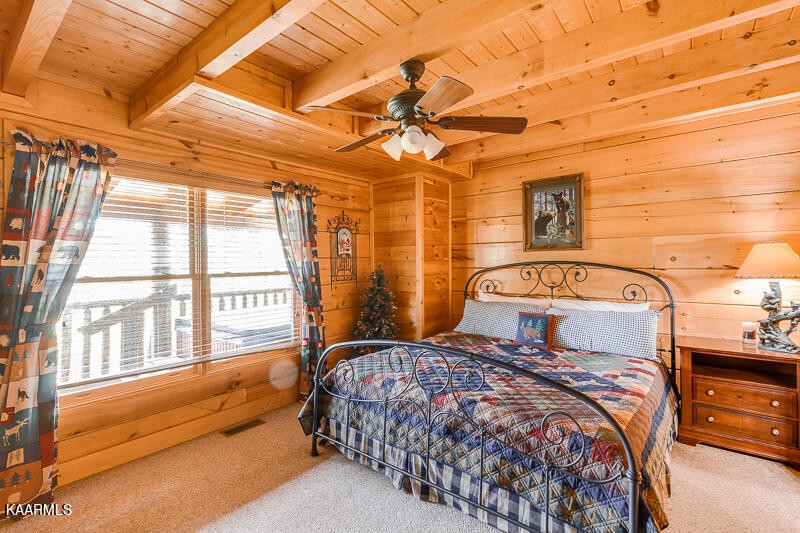 1304 Timberwolf Way Sevierville, TN 37876 - Photo 13 of 36 a bedroom with a large bed and a large window