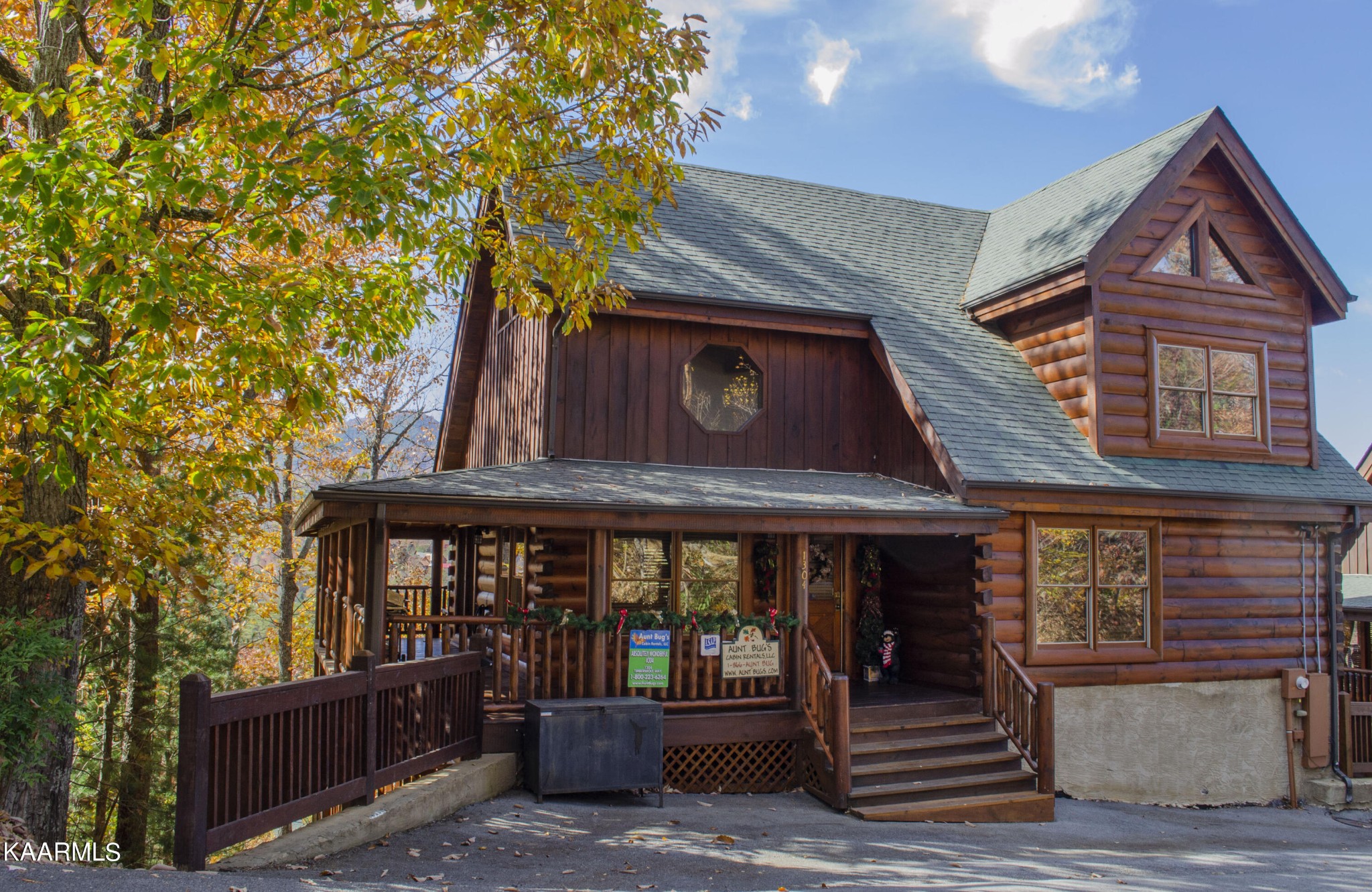 1304 Timberwolf Way Sevierville, TN 37876 - Photo 2 of 36 a front view of a house with entryway