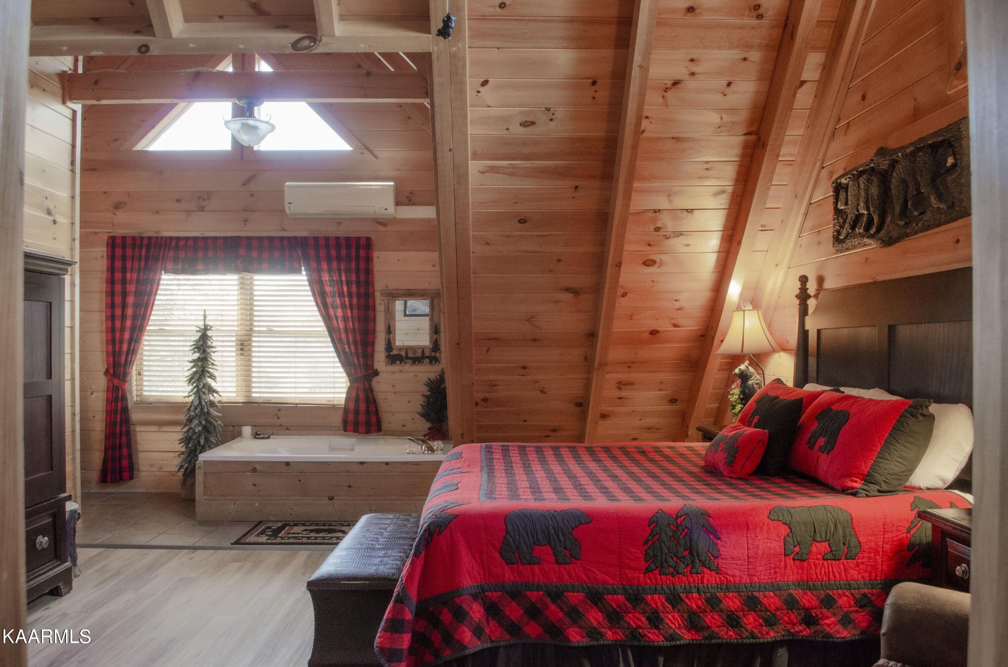 1304 Timberwolf Way Sevierville, TN 37876 - Photo 21 of 36 a bedroom with a bed and a large window