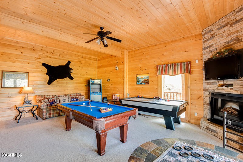 1304 Timberwolf Way Sevierville, TN 37876 - Photo 25 of 36 a living room with furniture pool table and a flat screen tv