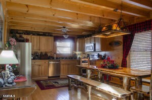 1304 Timberwolf Way Sevierville, TN 37876 - Photo 9 of 36 a room with lots of wooden furniture