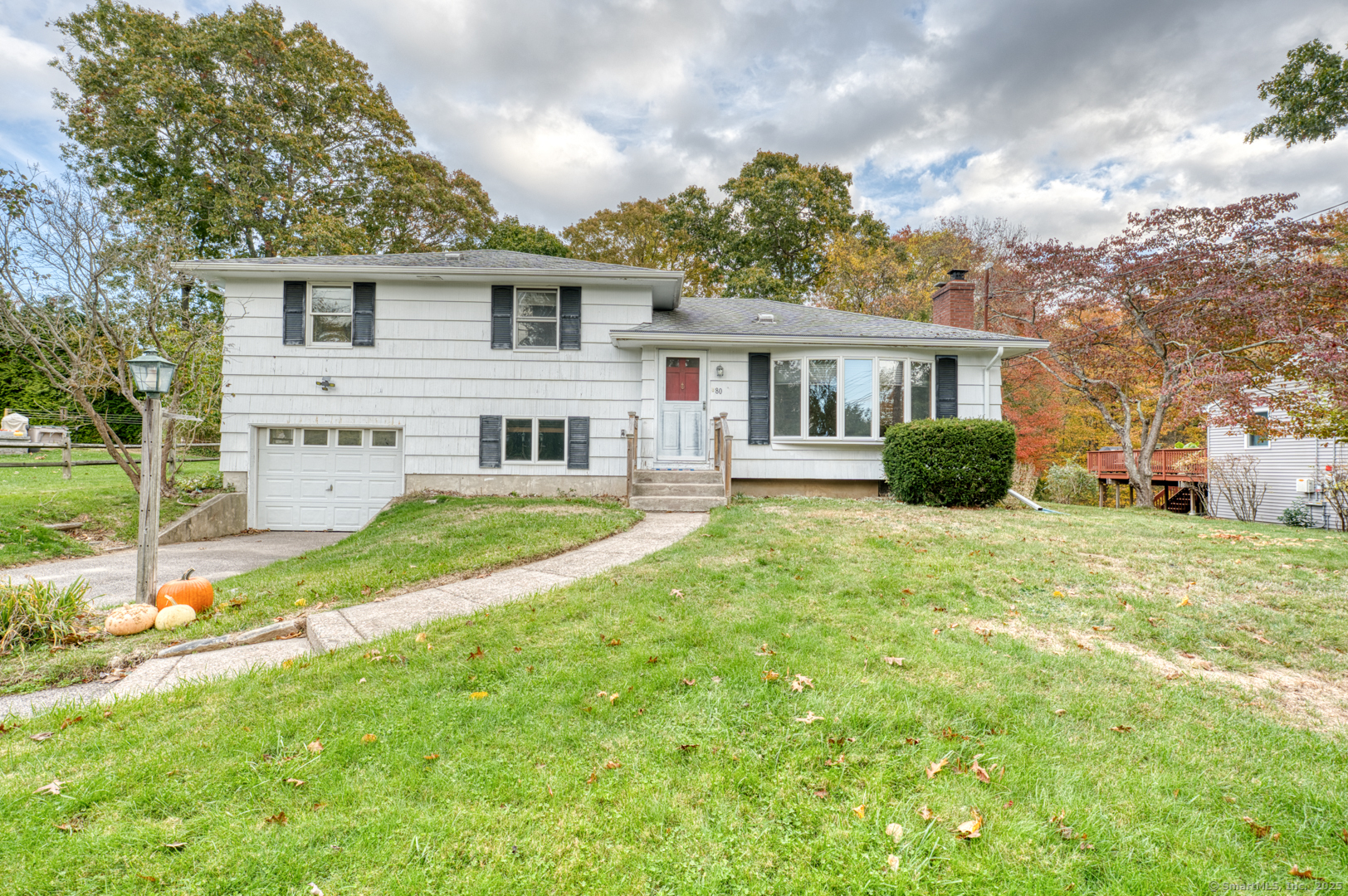 80 Farmstead Avenue Groton, CT 06355 - Photo 1 of 1 front view of a house with a yard