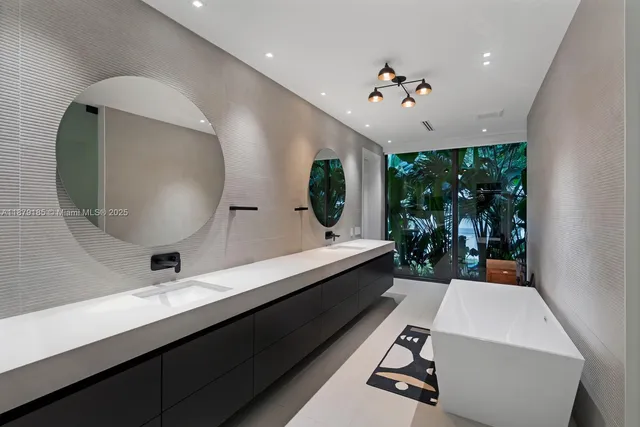 a bedroom with furniture and a flat screen tv