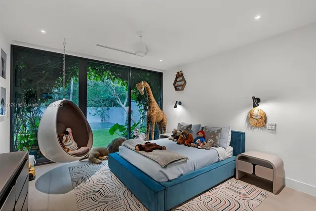 a living room with furniture and windows