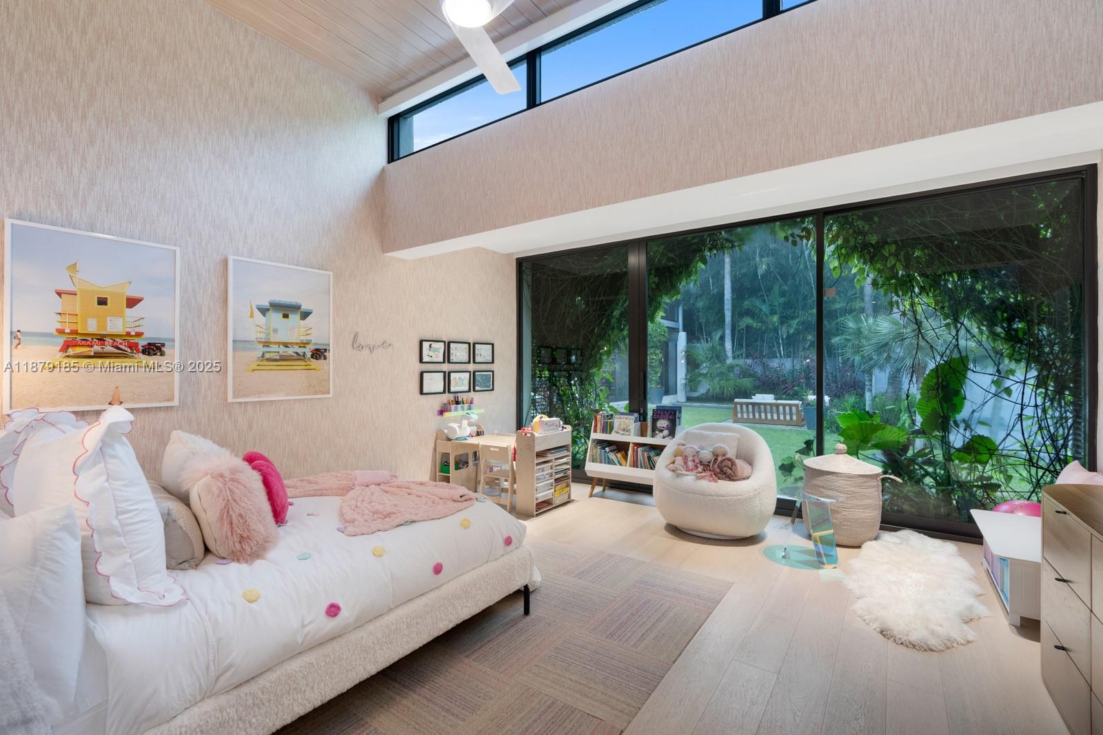 3651 St Gaudens Road Coconut Grove, FL 33133 - Photo 36 of 70 a living room with furniture and large windows
