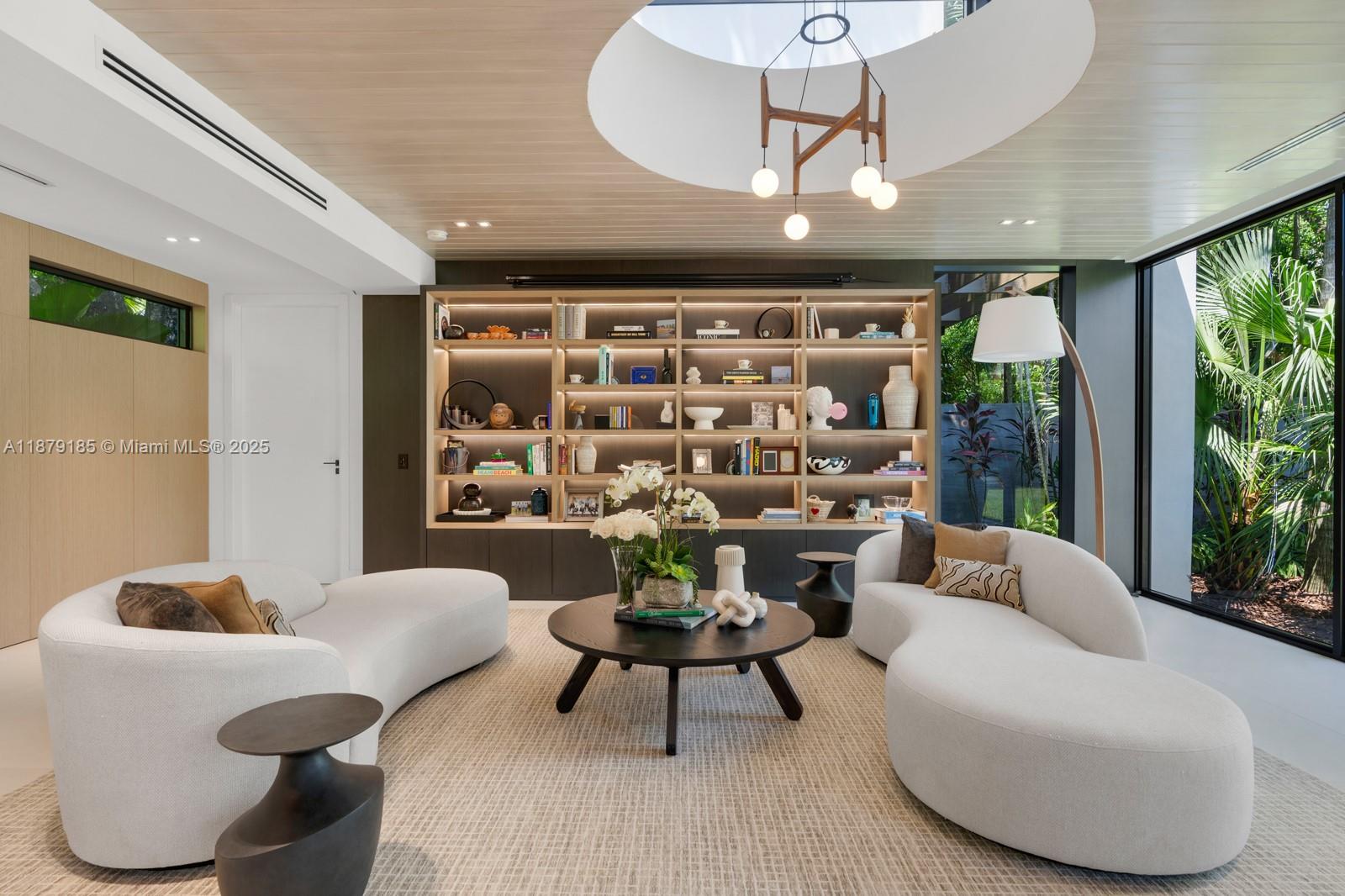 3651 St Gaudens Road Coconut Grove, FL 33133 - Photo 4 of 70 a living room with furniture and a large window