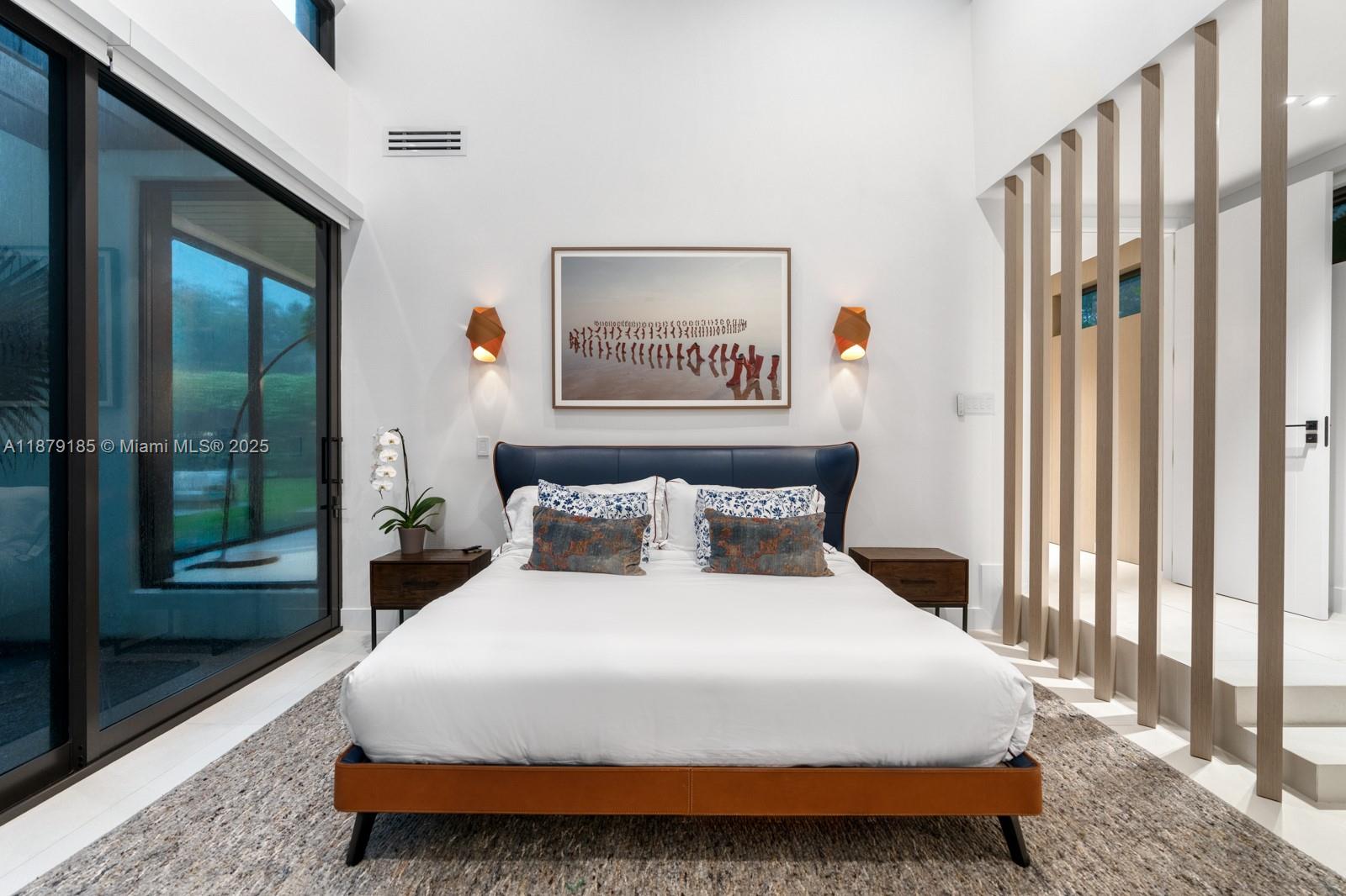 3651 St Gaudens Road Coconut Grove, FL 33133 - Photo 46 of 70 a bedroom with a bed and a window