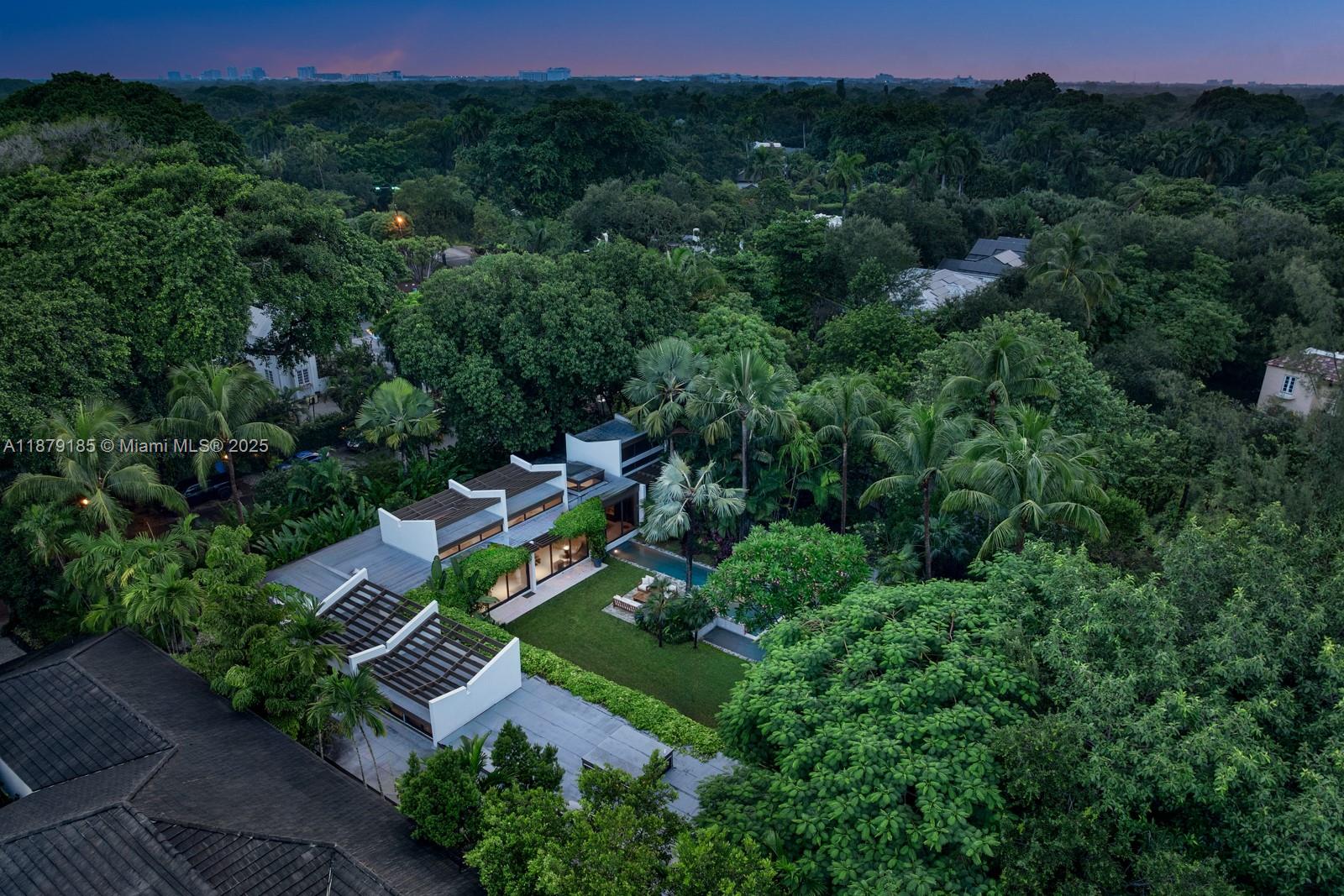 3651 St Gaudens Road Coconut Grove, FL 33133 - Photo 61 of 70 an aerial view of a house with outdoor space and street view