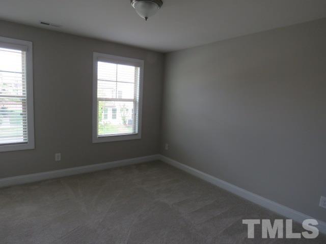 1517 Catch Fly Lane Durham, NC 27713 - Photo 26 of 44 an empty room with a window