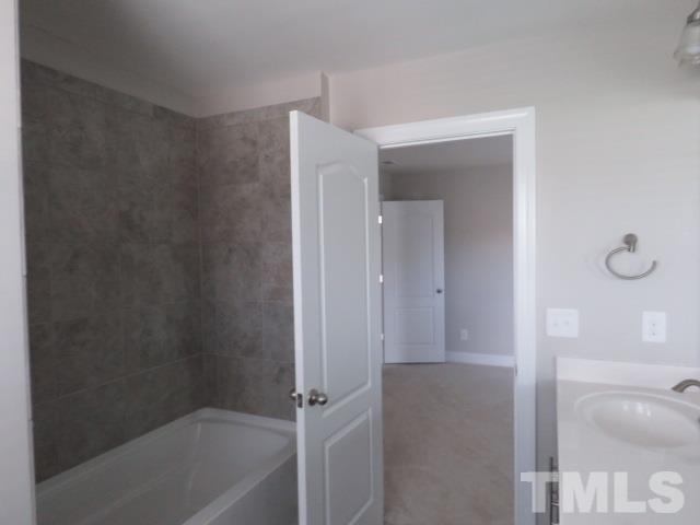 1517 Catch Fly Lane Durham, NC 27713 - Photo 30 of 44 a bathroom with a bathtub