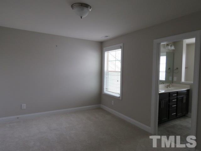 1517 Catch Fly Lane Durham, NC 27713 - Photo 31 of 44 an empty room with windows