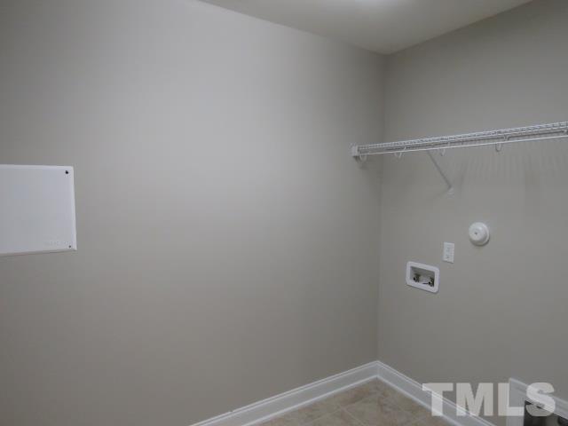 1517 Catch Fly Lane Durham, NC 27713 - Photo 33 of 44 a view of a room with racks on the wall