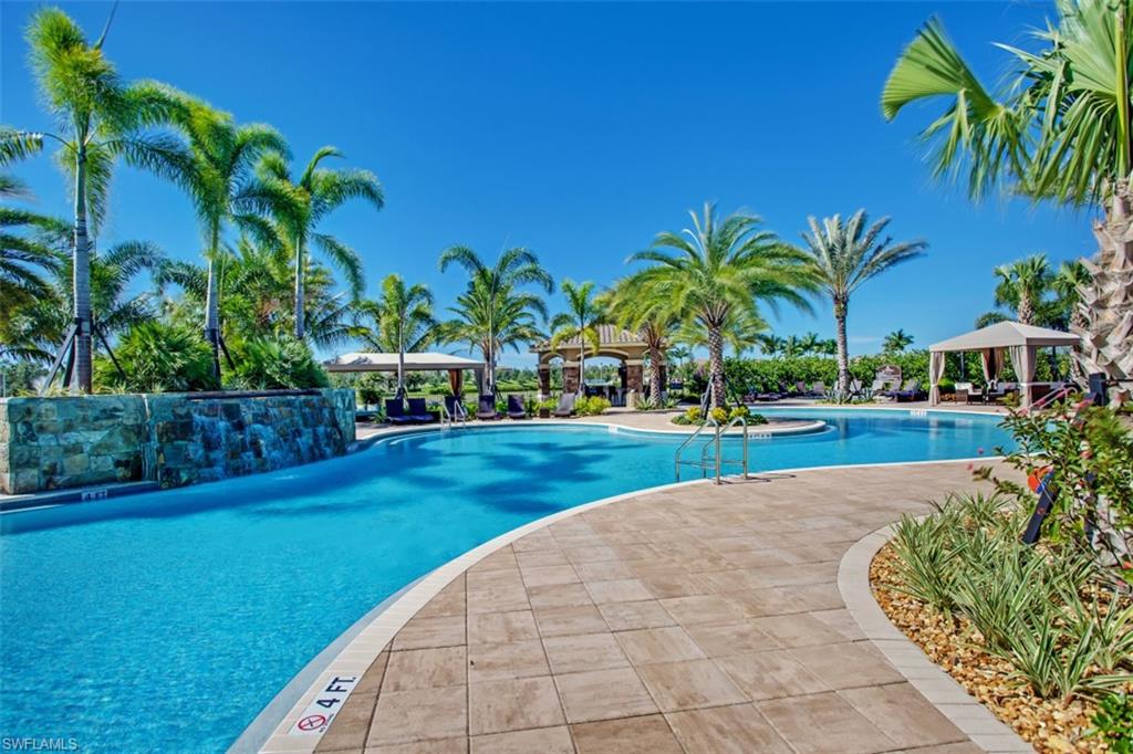 3487 Pacific Drive Naples, FL 34119 - Photo 25 of 33 a view of a yard with a patio