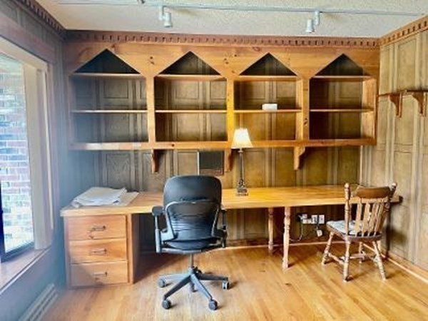 128 North Street Rochester, MA 02770 - Photo 12 of 32 a workspace with wooden floor and furniture
