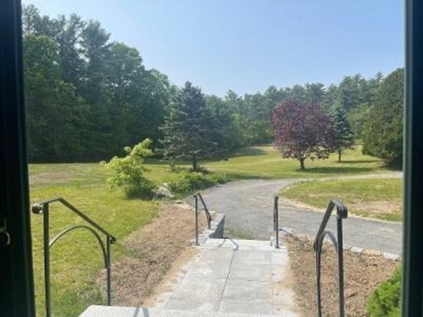 128 North Street Rochester, MA 02770 - Photo 6 of 32 a view of a swimming pool with a patio
