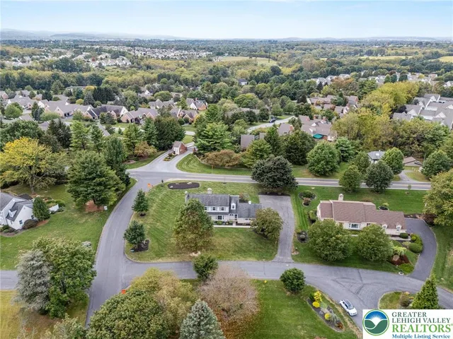 an aerial view of a city with lots of residential buildings