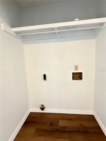 a view of small space with wooden floor