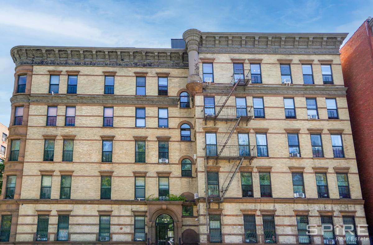 370 St Nicholas Avenue, Unit 5B Manhattan, NY 10027 - Photo 22 of 23 a front view of a building