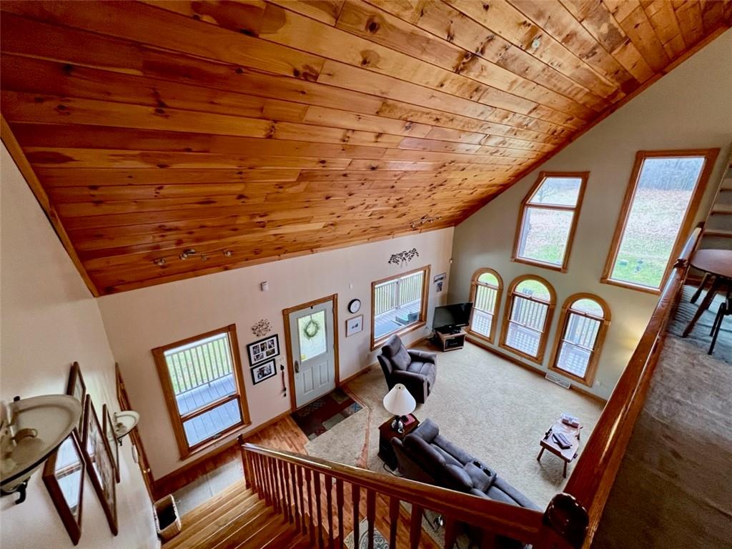 84 Mc Ewen Road Mercer, PA 16137 - Photo 11 of 18 a view of a livingroom with furniture hardwood floor and windows