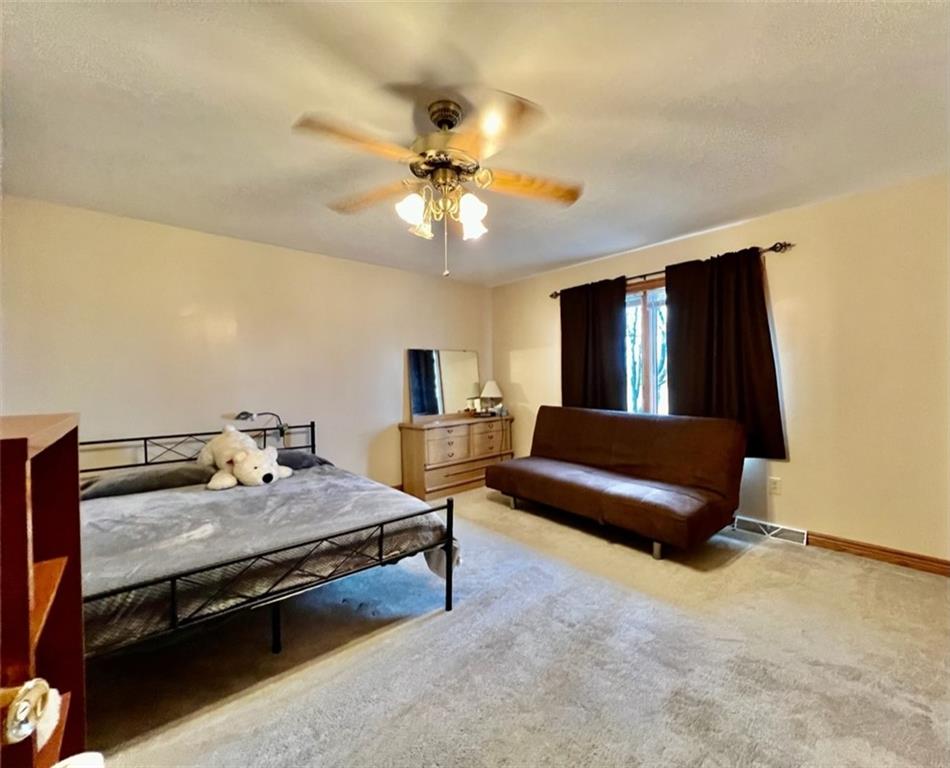 84 Mc Ewen Road Mercer, PA 16137 - Photo 14 of 18 a living room with furniture and a flat screen tv